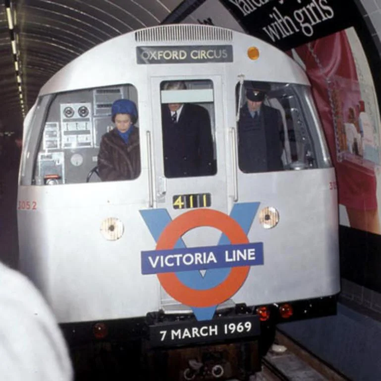 The queen in the drivers cab of a train to Victoria on 7 March 1969